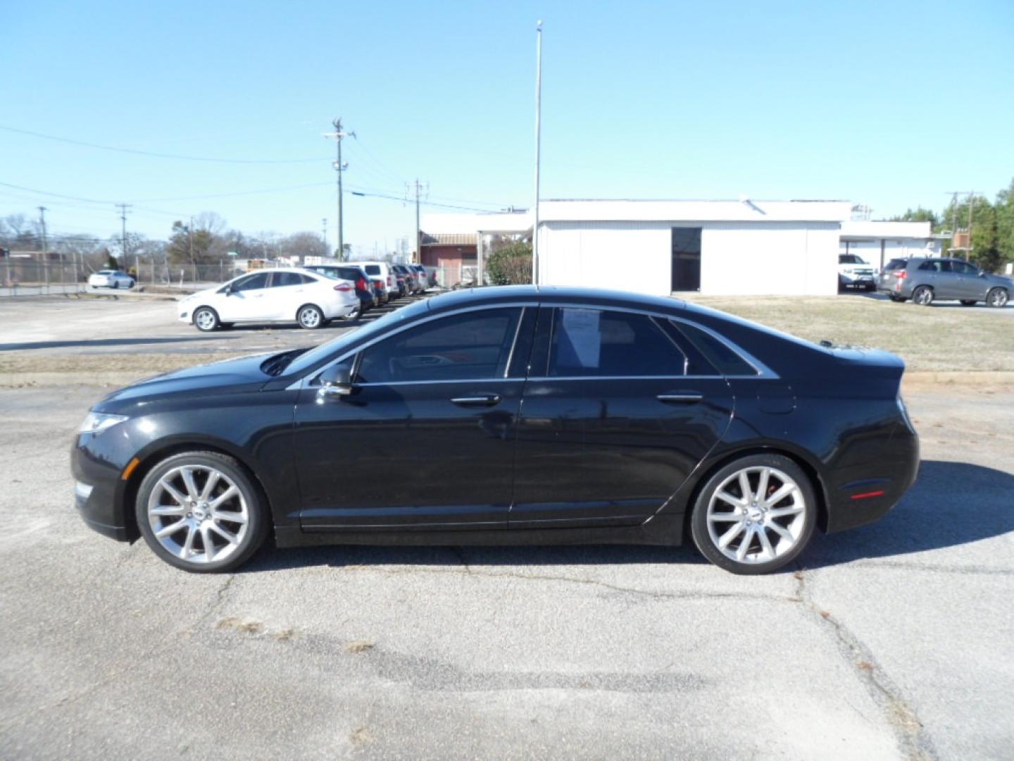 2014 BLACK /BLACK Lincoln MKZ (3LN6L2G9XER) , AUTOMATIC transmission, located at 2812 White Horse Road, Greenville, SC, 29611, (864) 269-1711, 34.808655, -82.434776 - 2.0 LITER 4 CYLINDER ENGINE,19 ICH ALLOY WHEELS,ANTI LOCK BRAKES,ANTI THEFT SYSTEM,TILT/REACH STEERING,2 ZONE A/C CLITMATE CONTROL,DUAL AIRBAGS,FRONT/REAR SIDE AIRBAGS,BODY COLOR BUMPERS,MIRRORS,AND DOOR HANDLES,CRUISE CONTROL,FOG LIGHTS,AUTOMATIC HEADLIGHTS,USB OUTLET,LIT VANITY MIRRORS,LEATHER SEA - Photo#3
